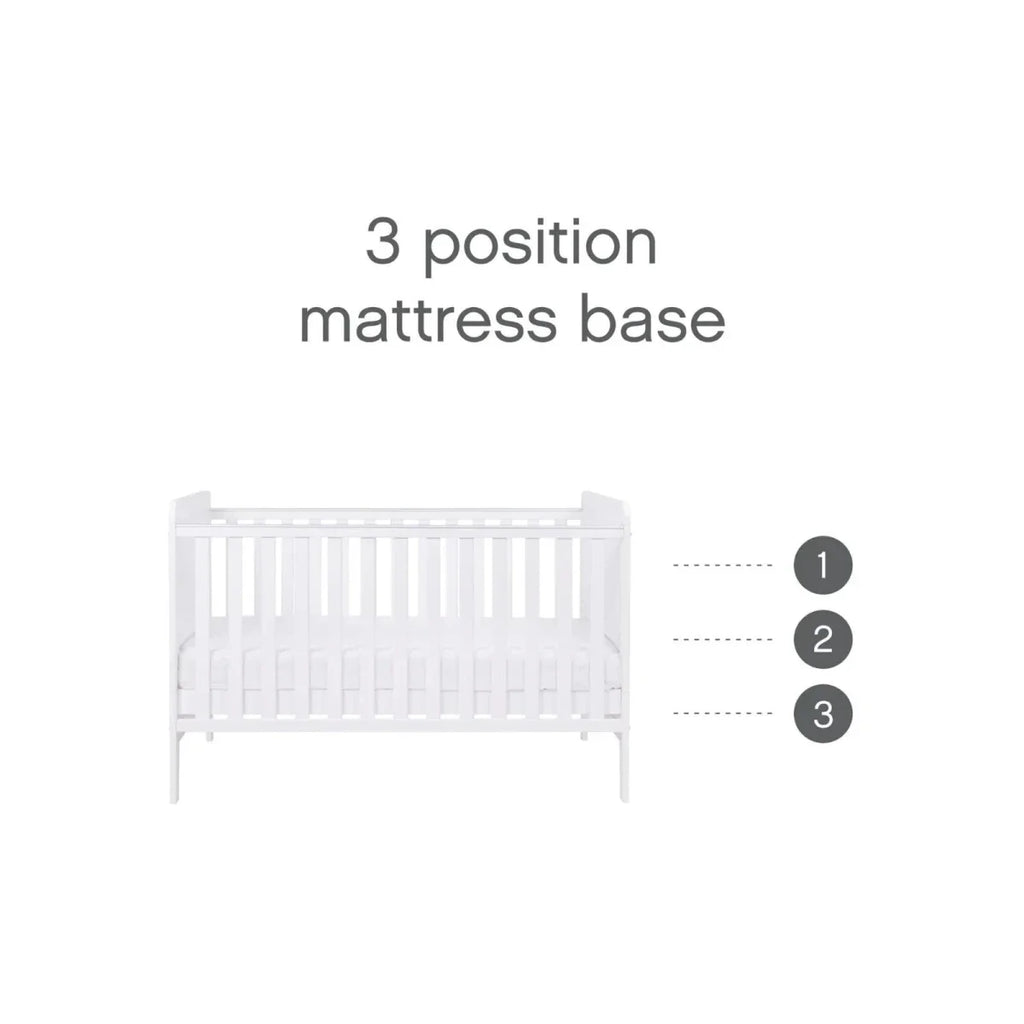 White cot bed mattress base shown in three height positions