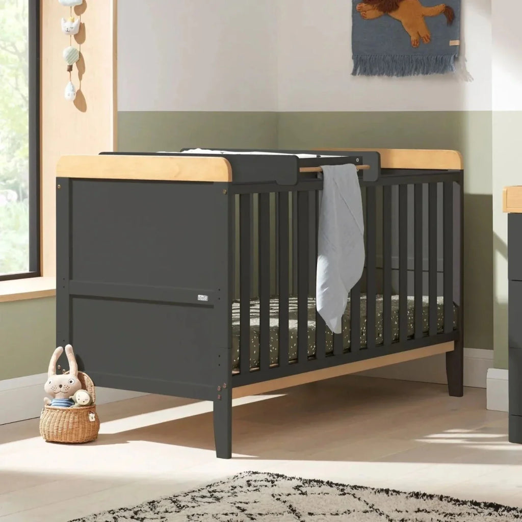 Dark slate cot bed with honey oak rails and vertical slats