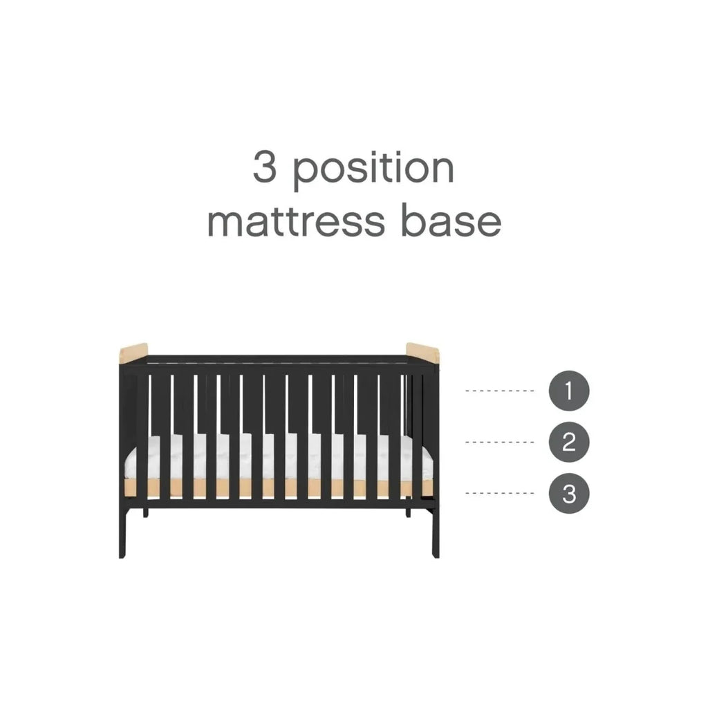 Cot bed base showing three mattress positions with dark slate frame and slats