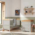 Dove grey child cot bed set with slatted sides and light wood top rail
