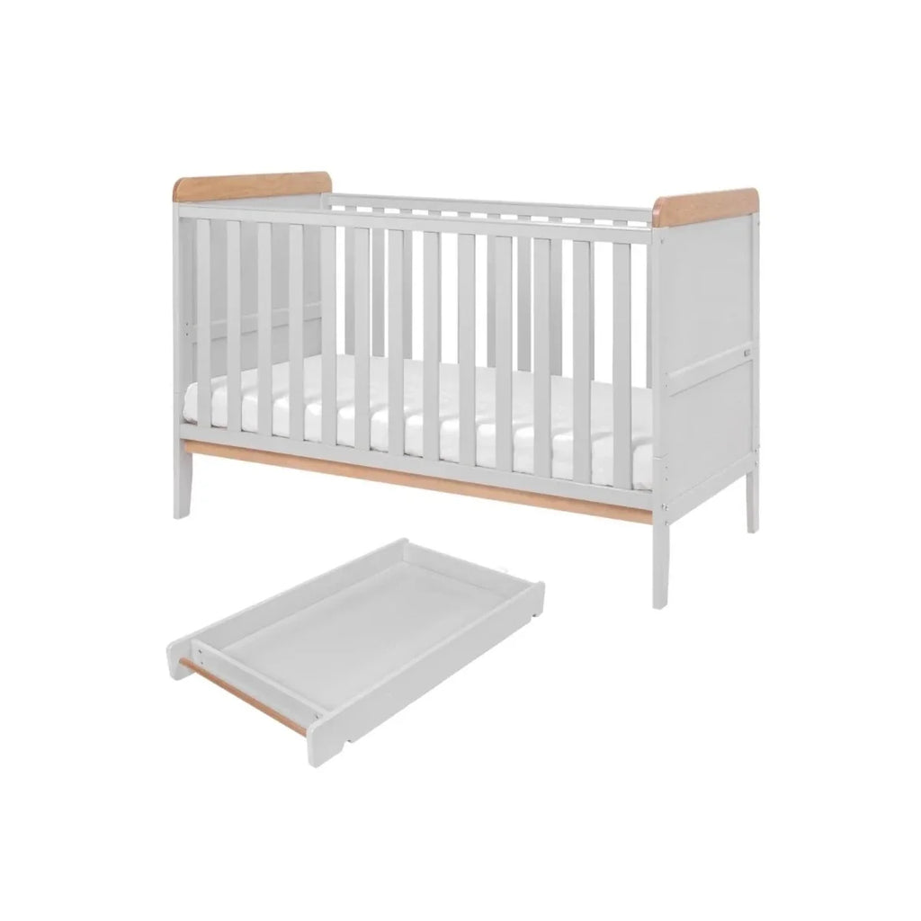 Convertible junior bed with built-in side access and light wood mattress rails