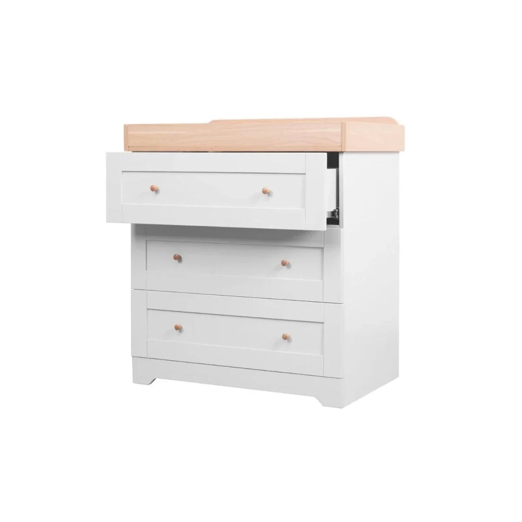 White baby dresser with light wood top, three drawers and wooden knob handles