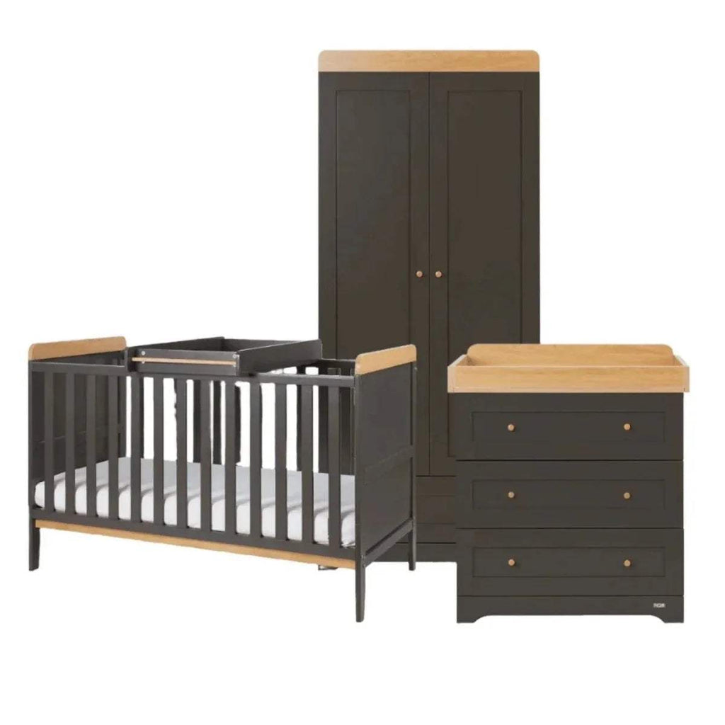 Cot bed with slate gray sides, honey oak headboards, and matching chest drawers and wardrobe