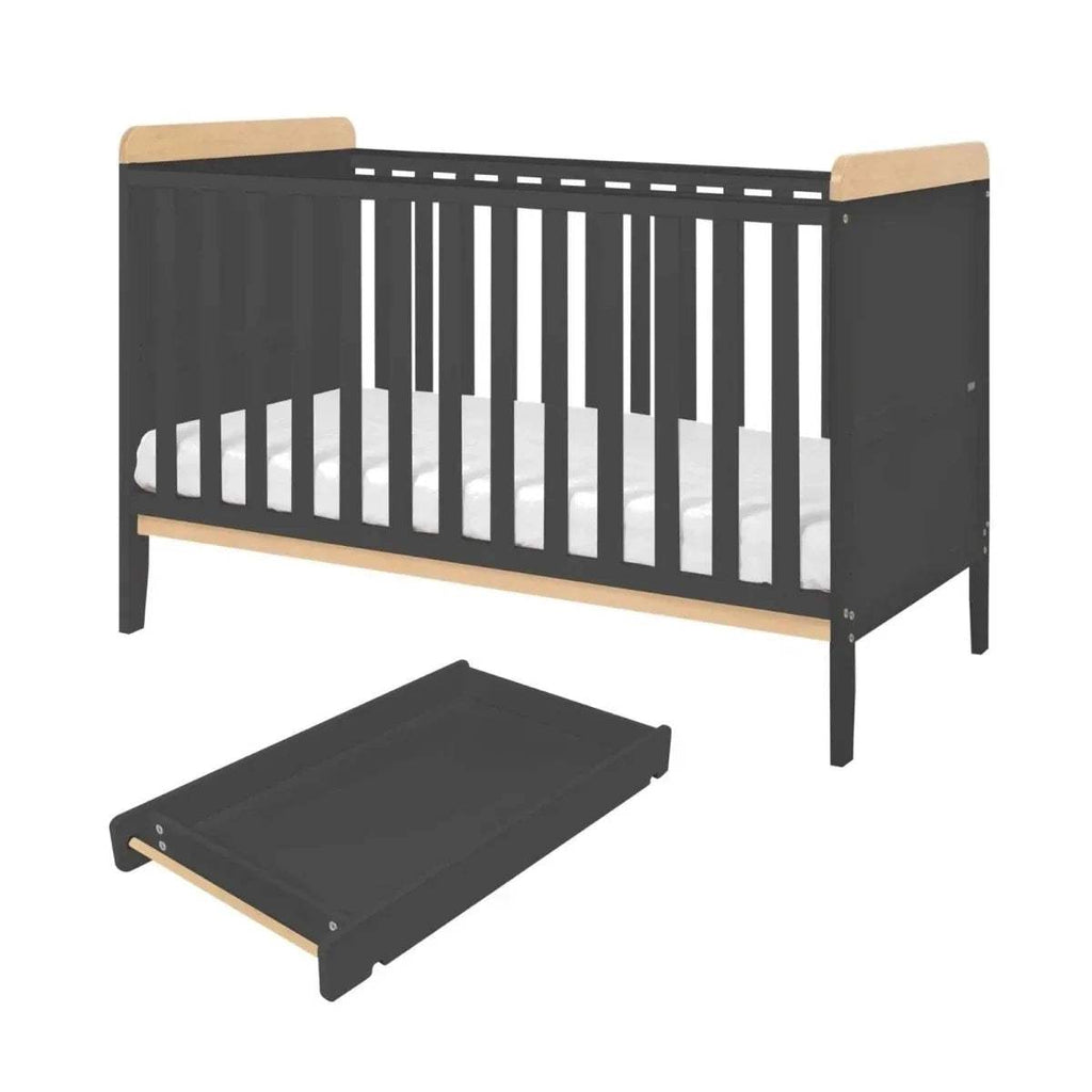 Cot bed with slate gray end panels, honey oak rails, and a matching under-bed mattress base tray