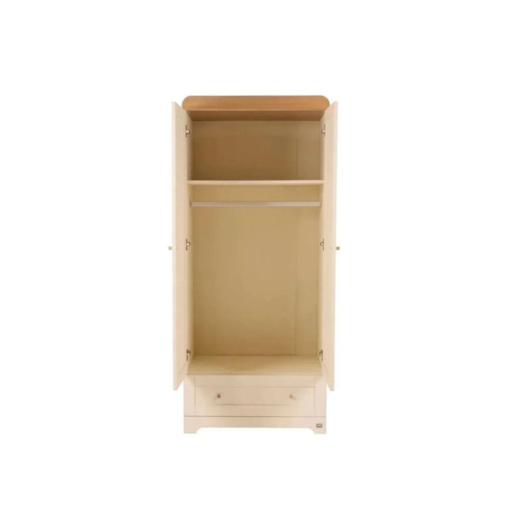 Cream wardrobe cabinet opened to show internal storage shelves, honey oak top