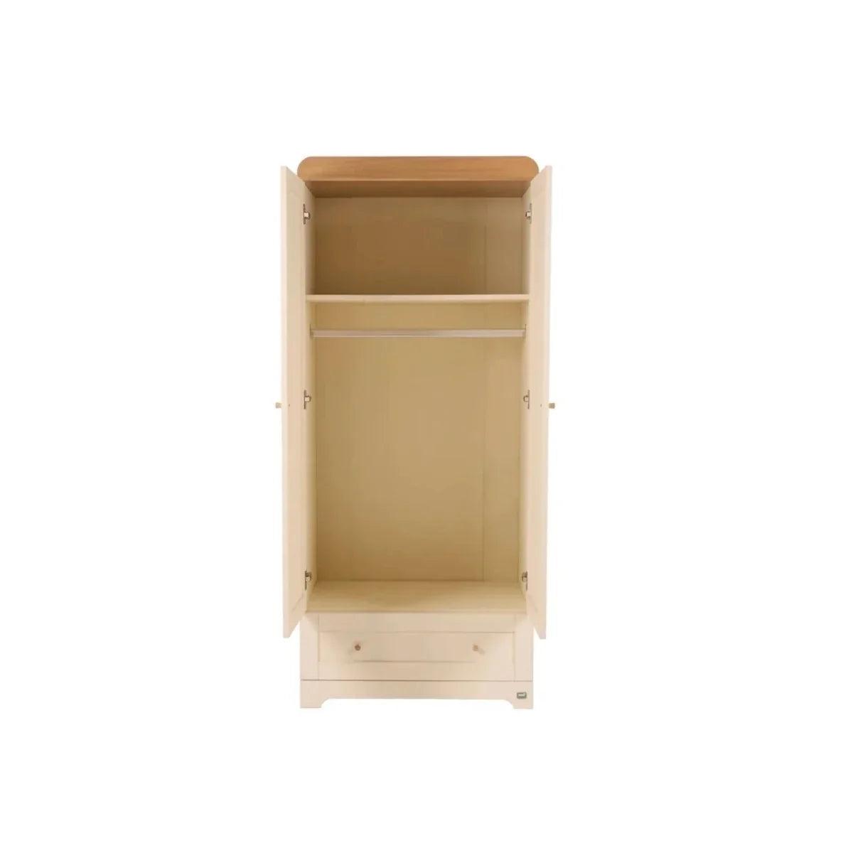 Cream wardrobe cabinet opened to show internal storage shelves, honey oak top