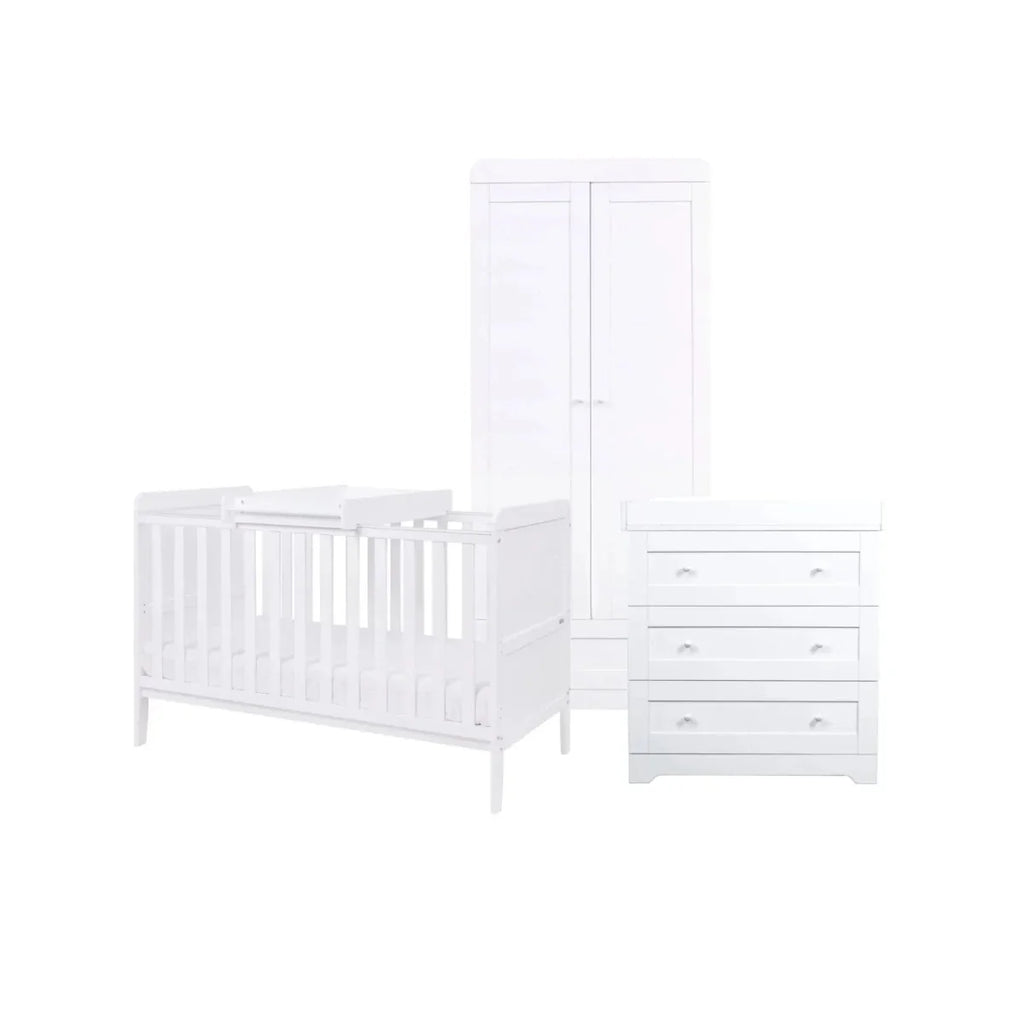 White cot bed with sprung mattress, plus wardrobe and dresser in matching set