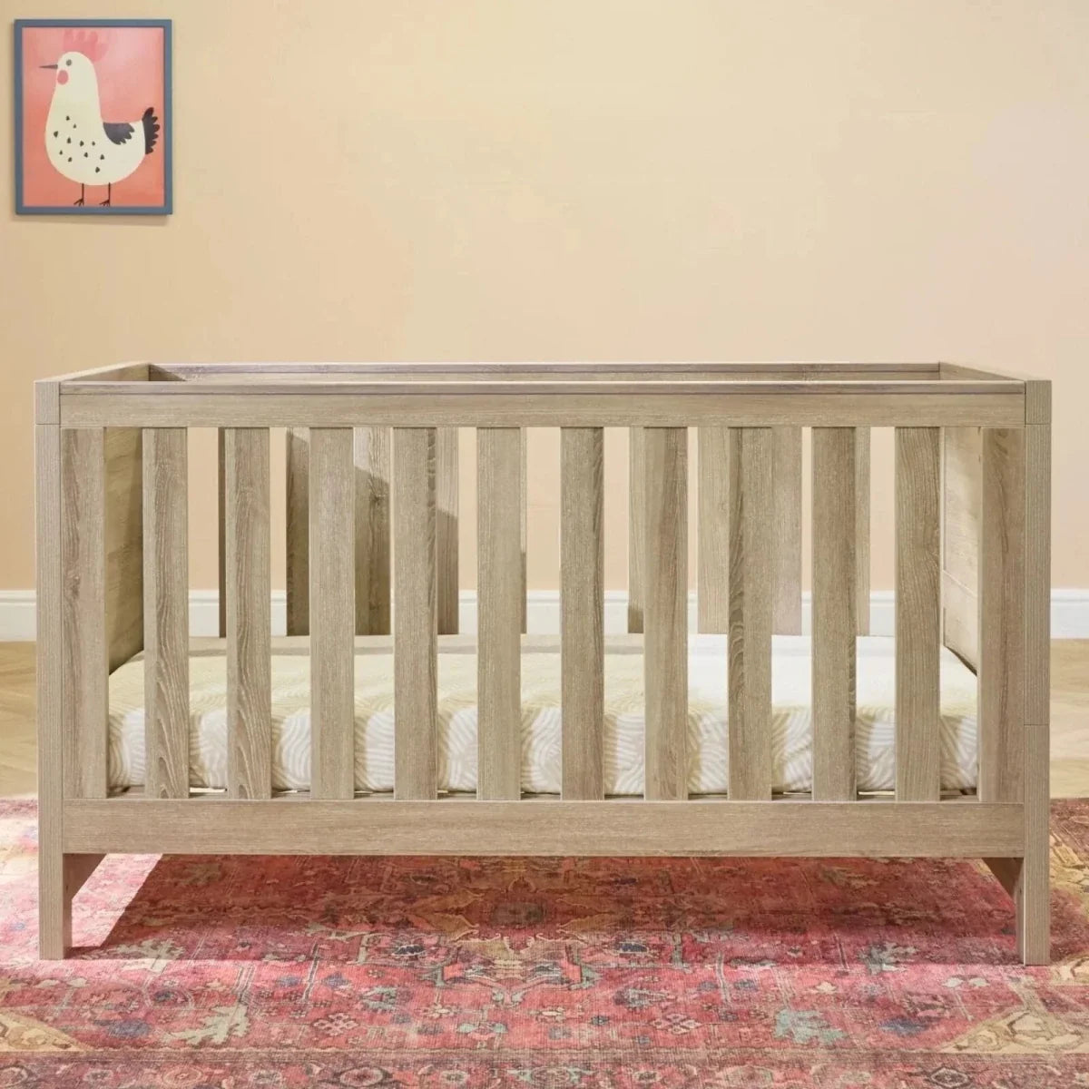 Oak cot bed frame with tall side rails and mattress base