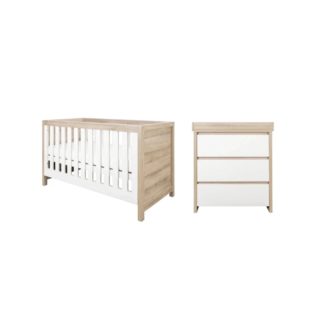 Convertible child bed set: white slat cot frame and light oak drawer unit