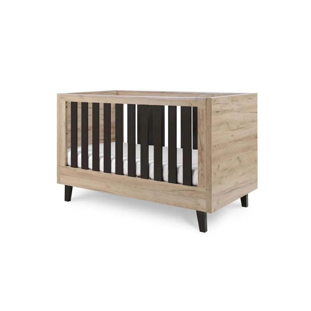Distressed oak cot bed with dark slat side panel and solid end panels