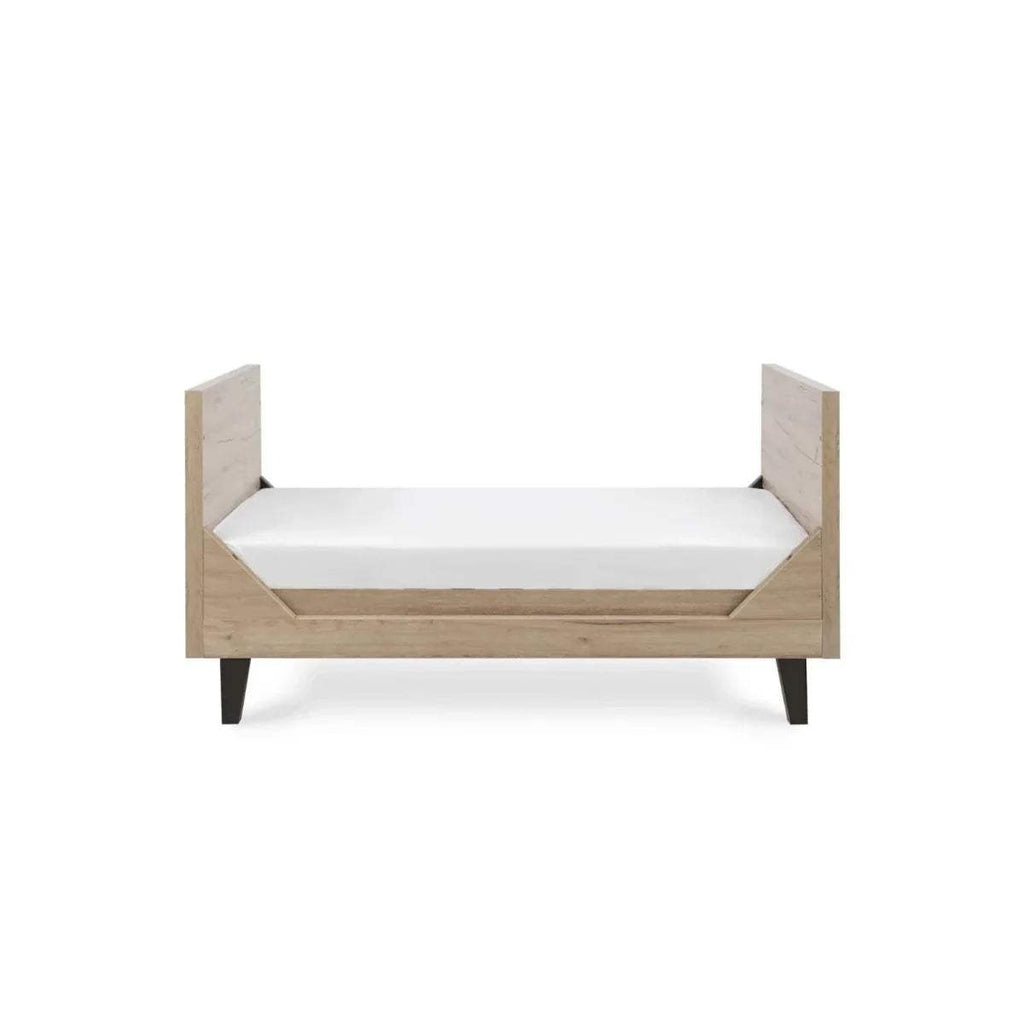 Junior bed frame with distressed oak end panels and white mattress base