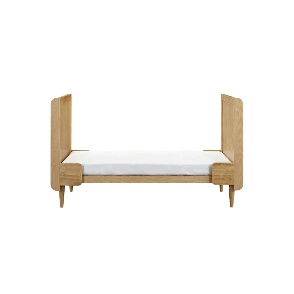Light oak cot bed with curved ends, short rails, and open base frame