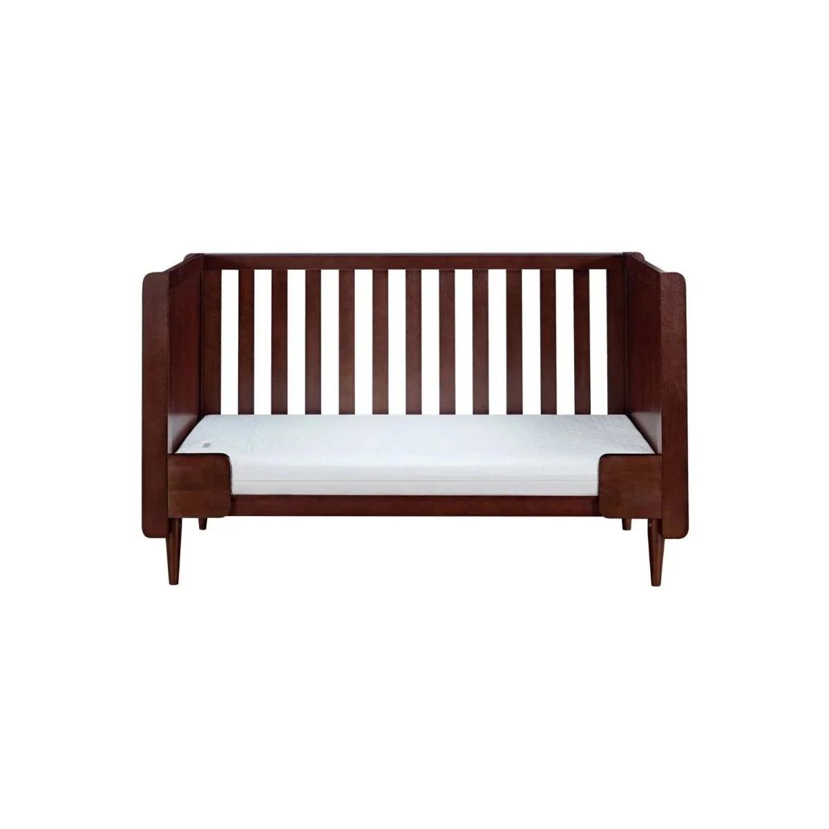 Tutti Bambini Japandi cot bed in warm walnut, slatted ends and white mattress
