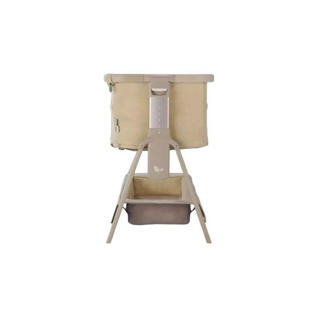 Sand bedside crib with padded side walls and freestanding legs