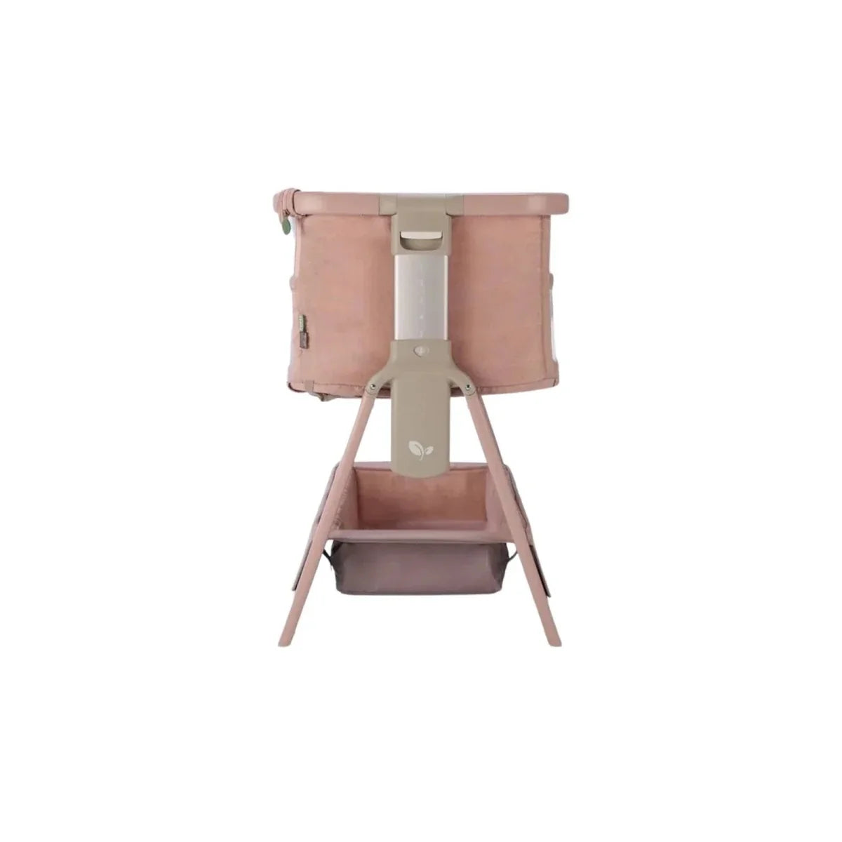 Blush bedside crib with front storage compartment and four wooden legs.