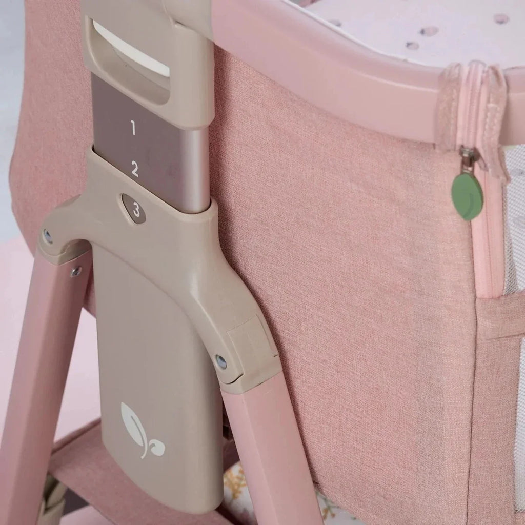 Blush bedside crib frame with adjustable leg mechanism and side panel