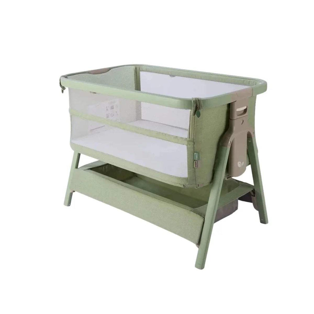 Eucalyptus green bedside crib with clear mesh sides and two-tier frame