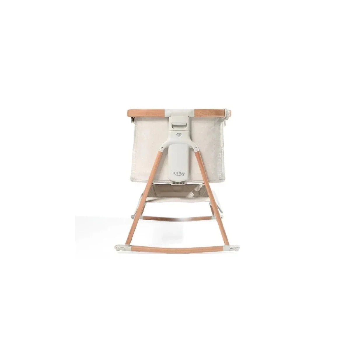 Ecru and walnut bedside crib, shown from front with rocking base