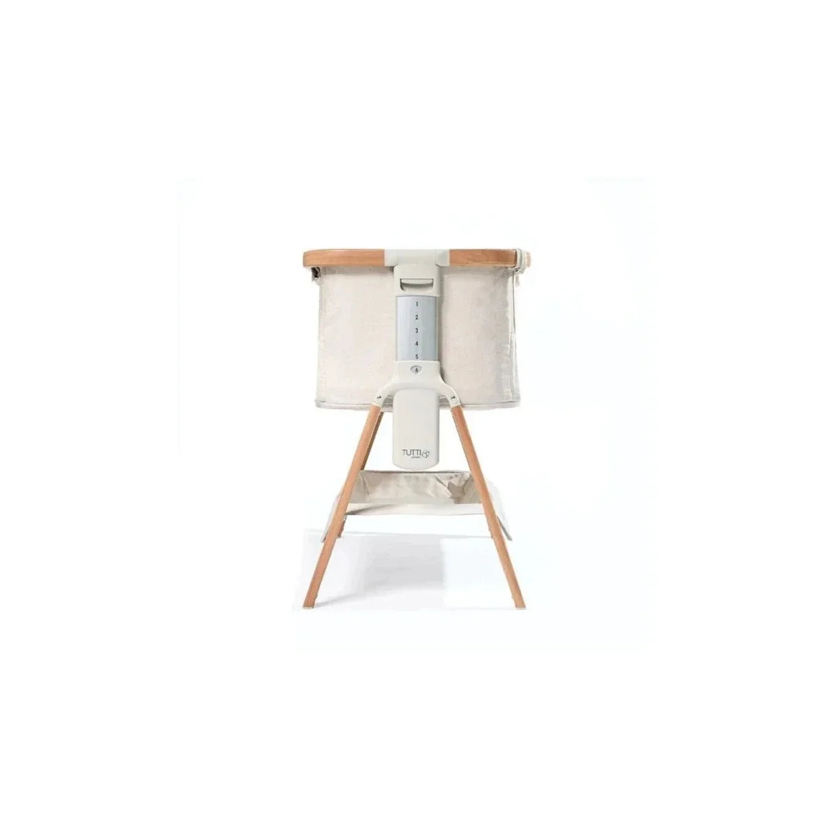 Ecru bedside crib with walnut legs and side panel view