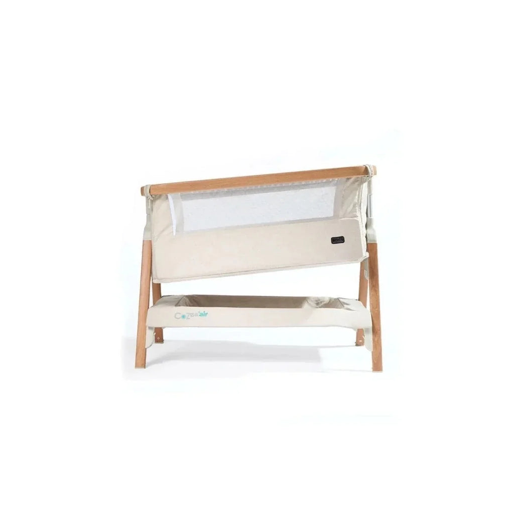 Ecru bedside crib with mesh window and walnut frame