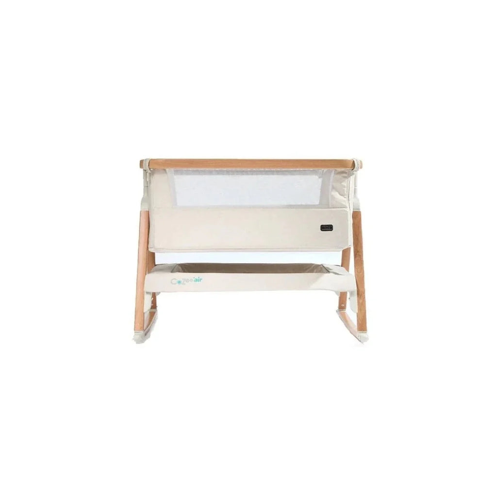 Ecru bedside crib with mesh sides and walnut base, front-facing