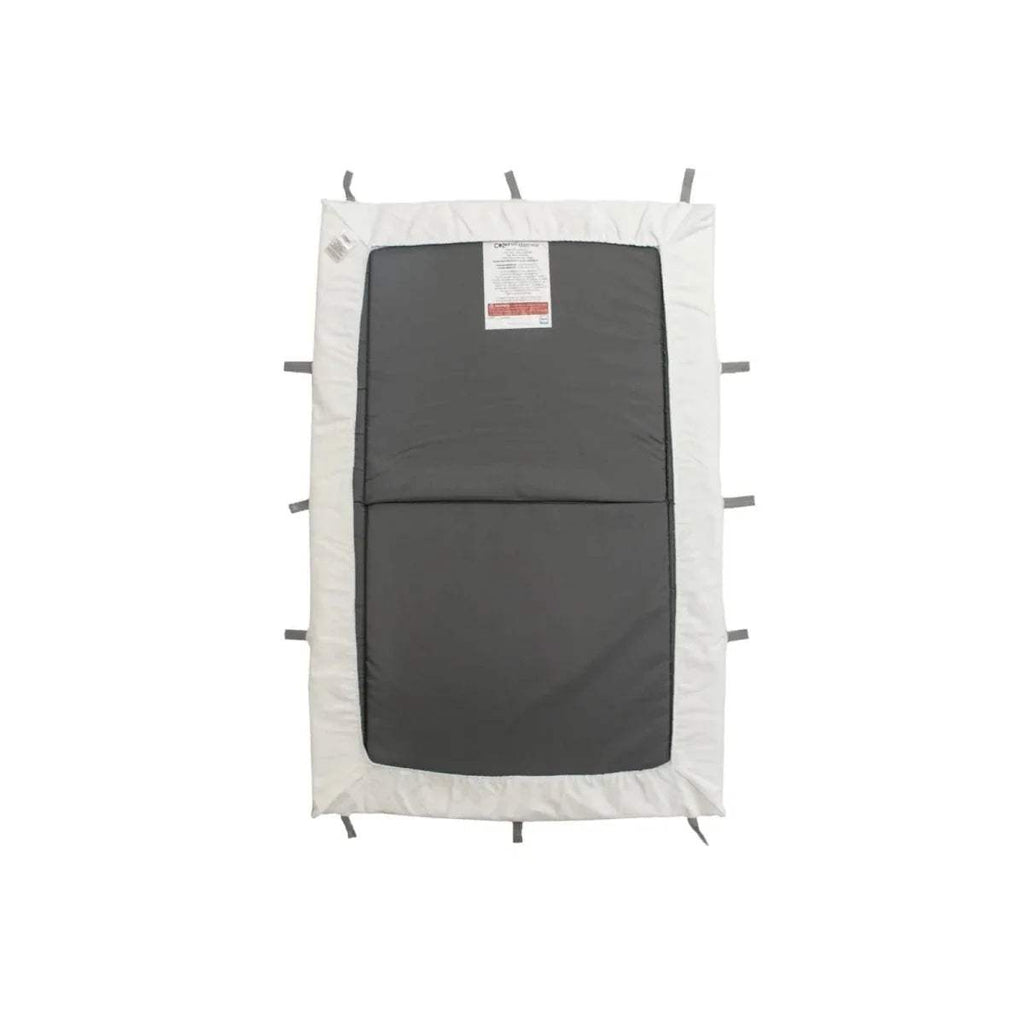 White waterproof fitted sheet with dark waterproof panel, attachment straps visible.