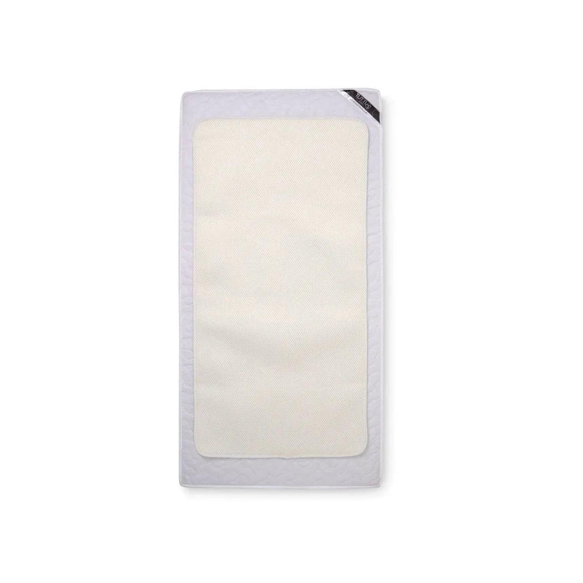 Breathable mattress topper protector, light cream pad, in retail packaging