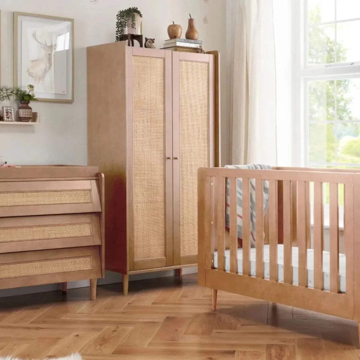 Light oak wardrobe with two woven-panel doors and tapered wooden legs