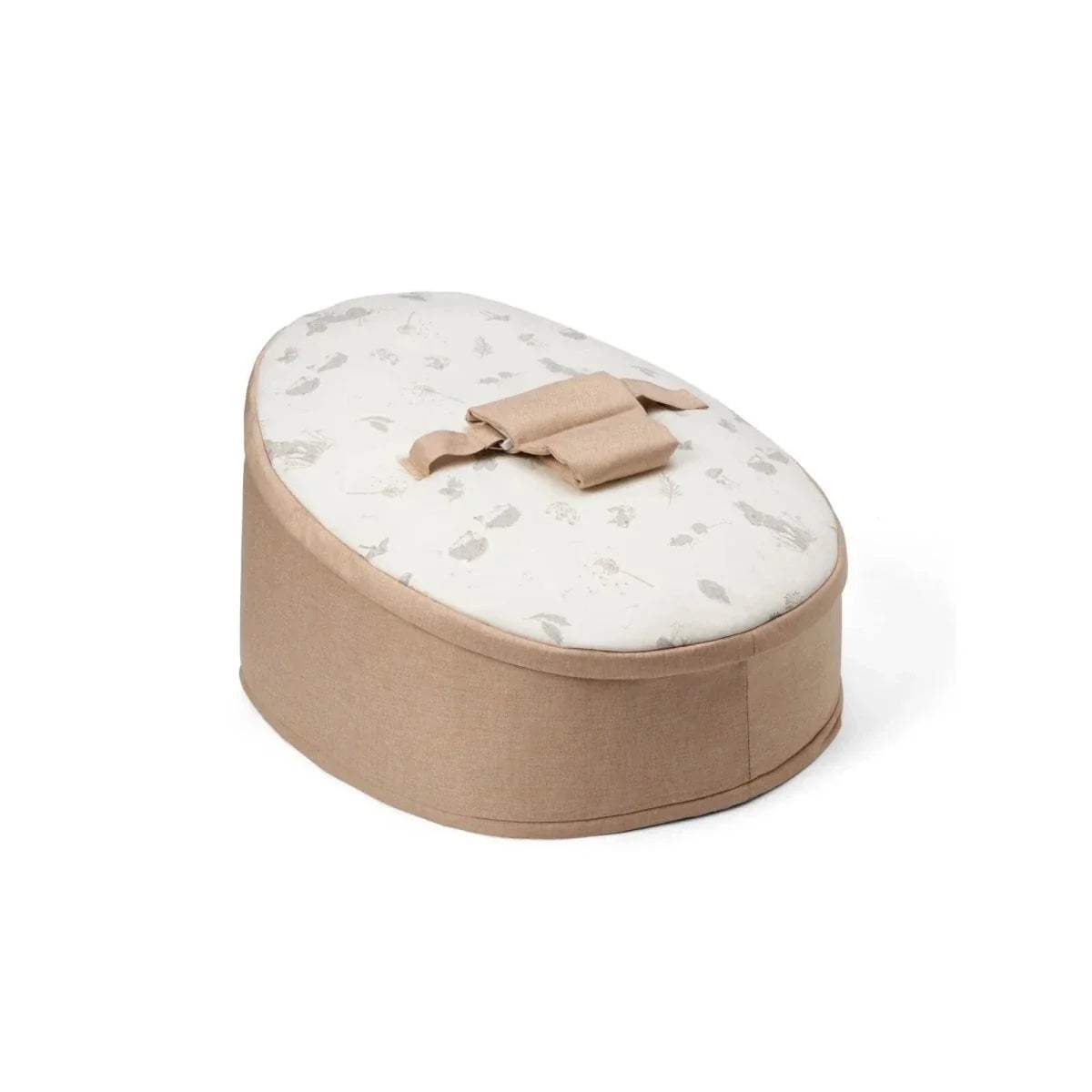 Round taupe baby beanbag with white animal-print top and beige bow strap