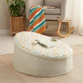 Baby beanbag with cream jungle animal print top and light gray rounded base