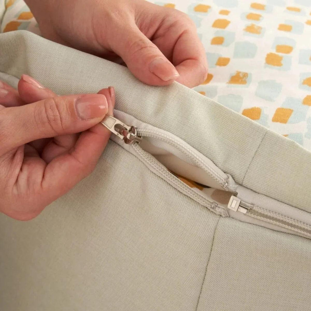 Baby beanbag cover zipper detail with light gray zipper and fabric edge