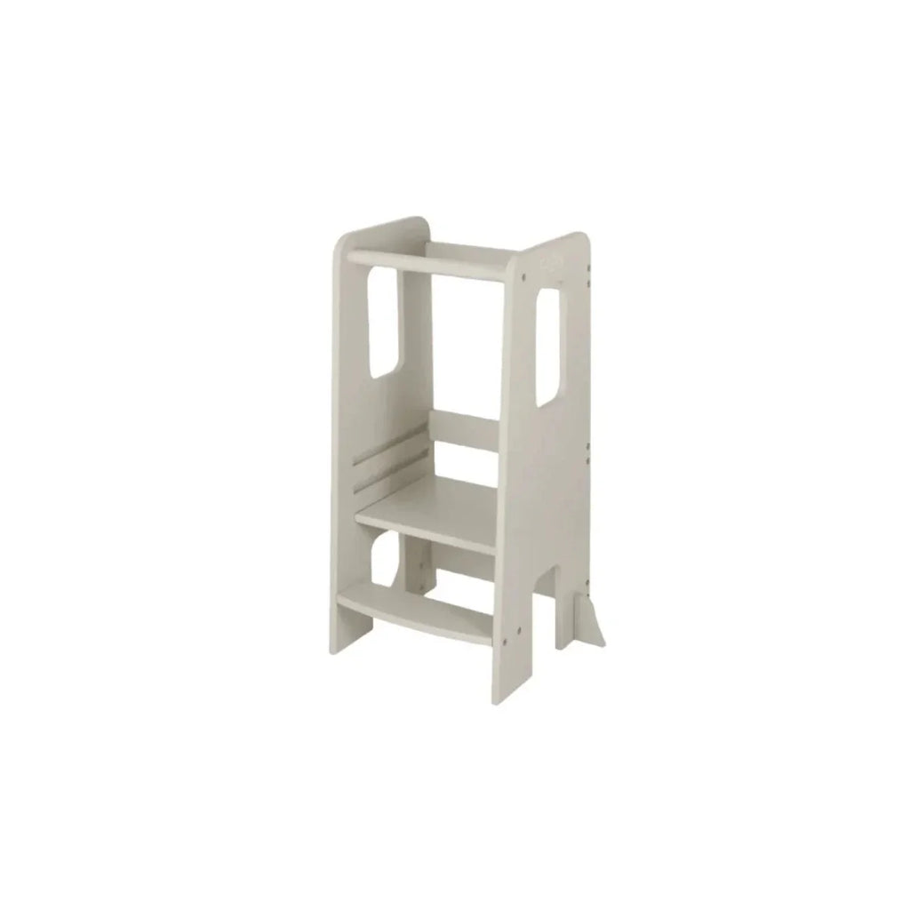 Light beige toddler learning tower with open front and two-tier step design