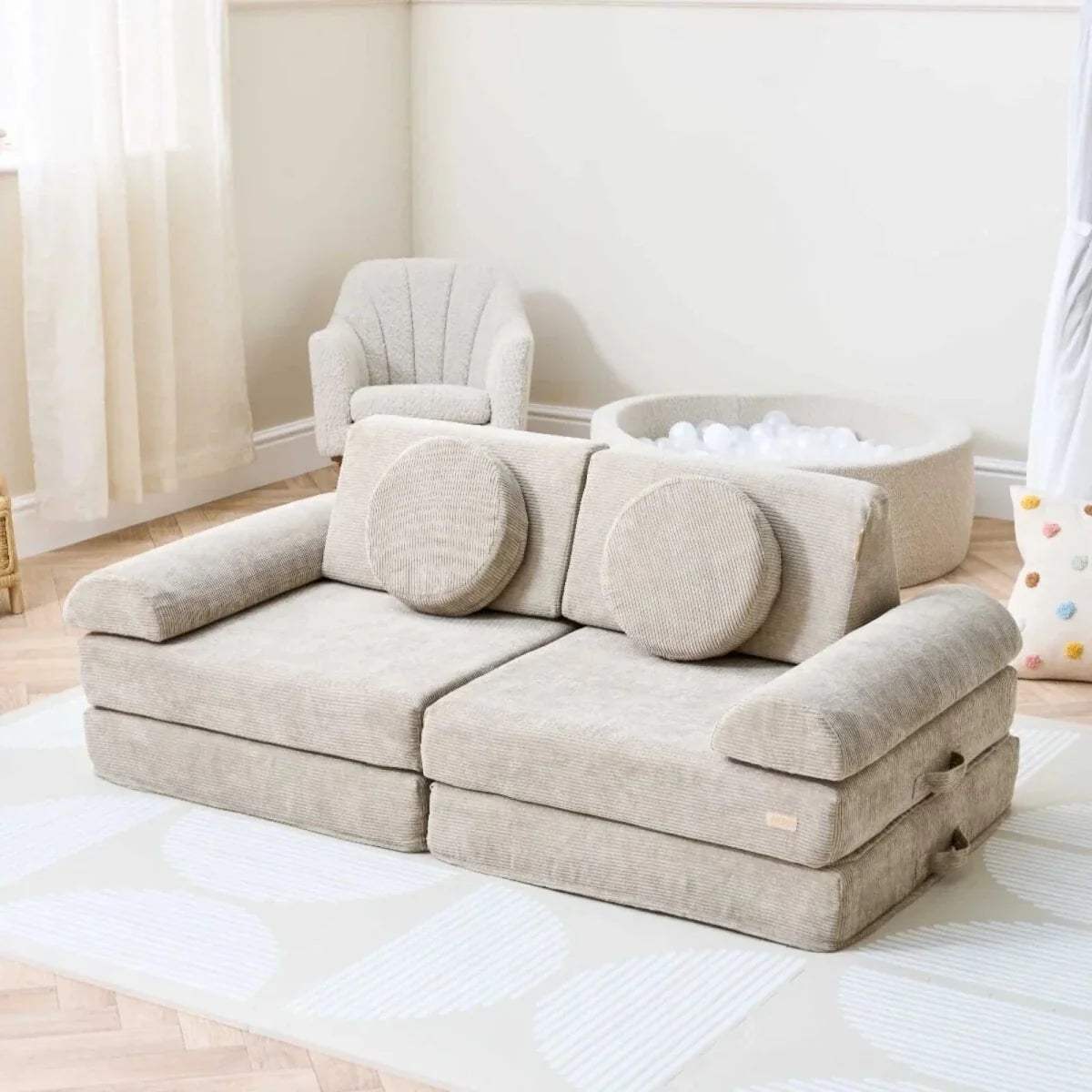 Kids play sofa with mushroom-beige fabric and rounded back cushions, Montessori-style set