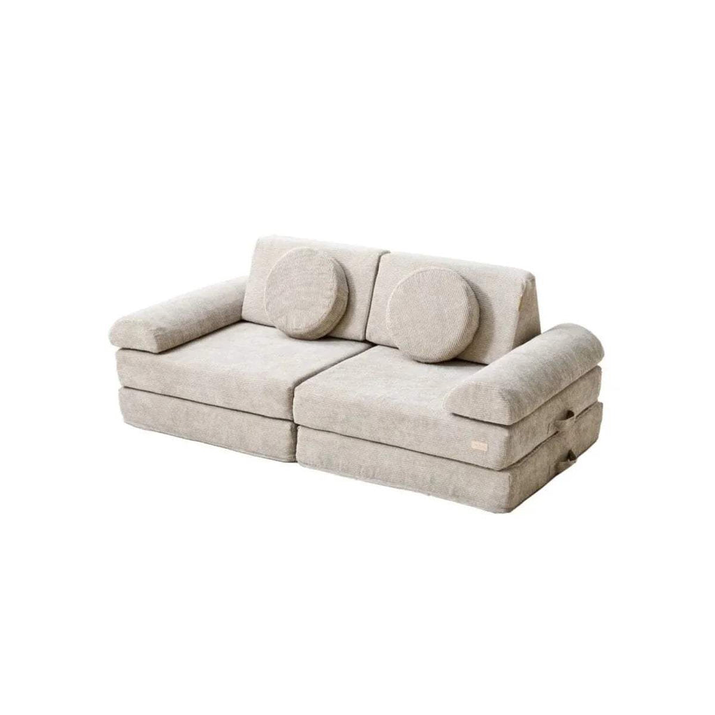 Mushroom-beige kids play sofa with low arms and rounded cushion seats, indoor play