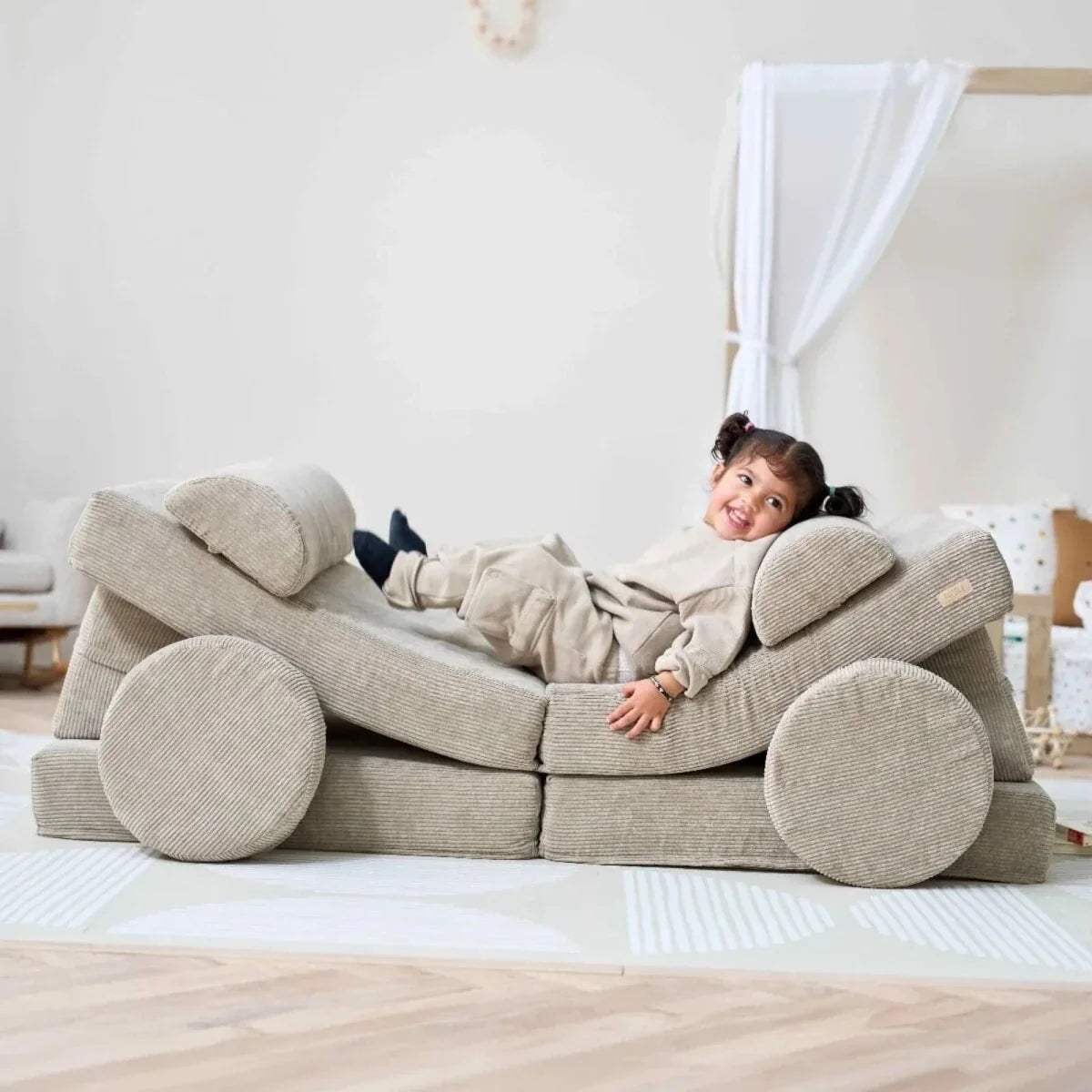 Kids play sofa in mushroom-beige fabric with built-in cushions and play blocks