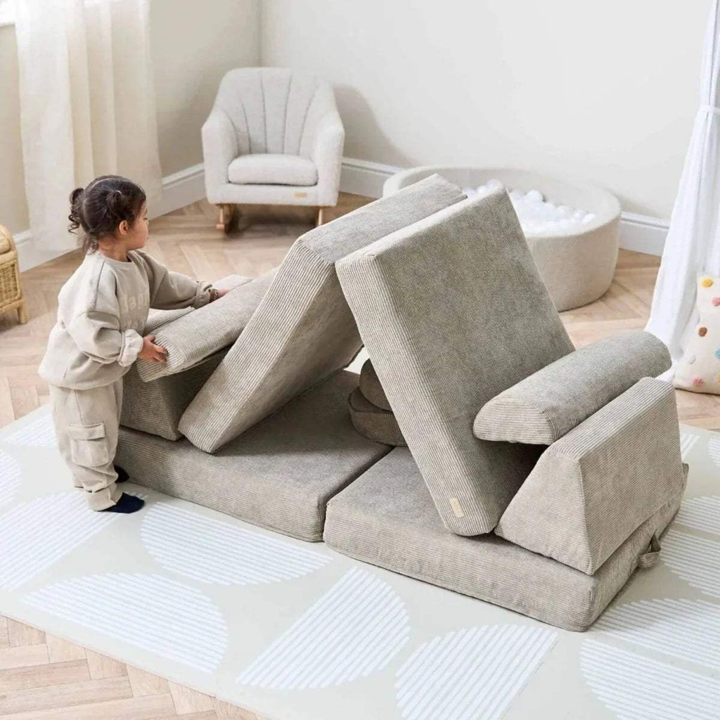 Children’s play sofa in mushroom-beige with tall angled cushion panel and side arm pieces