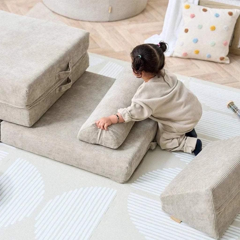 Kids play sofa in beige fabric with padded arms and back, mushroom color