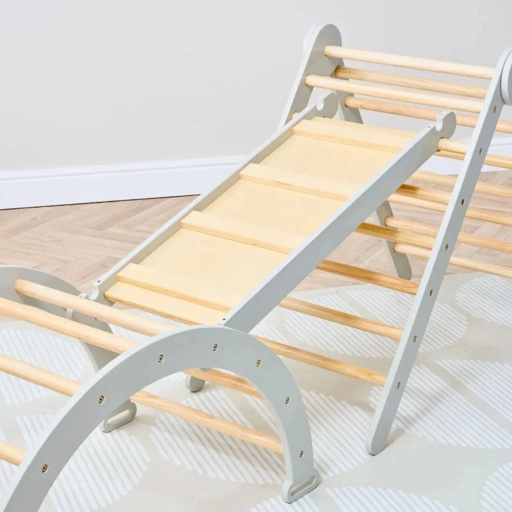 Slanted ladder section of Montessori climbing frame with gray frame and wooden rungs