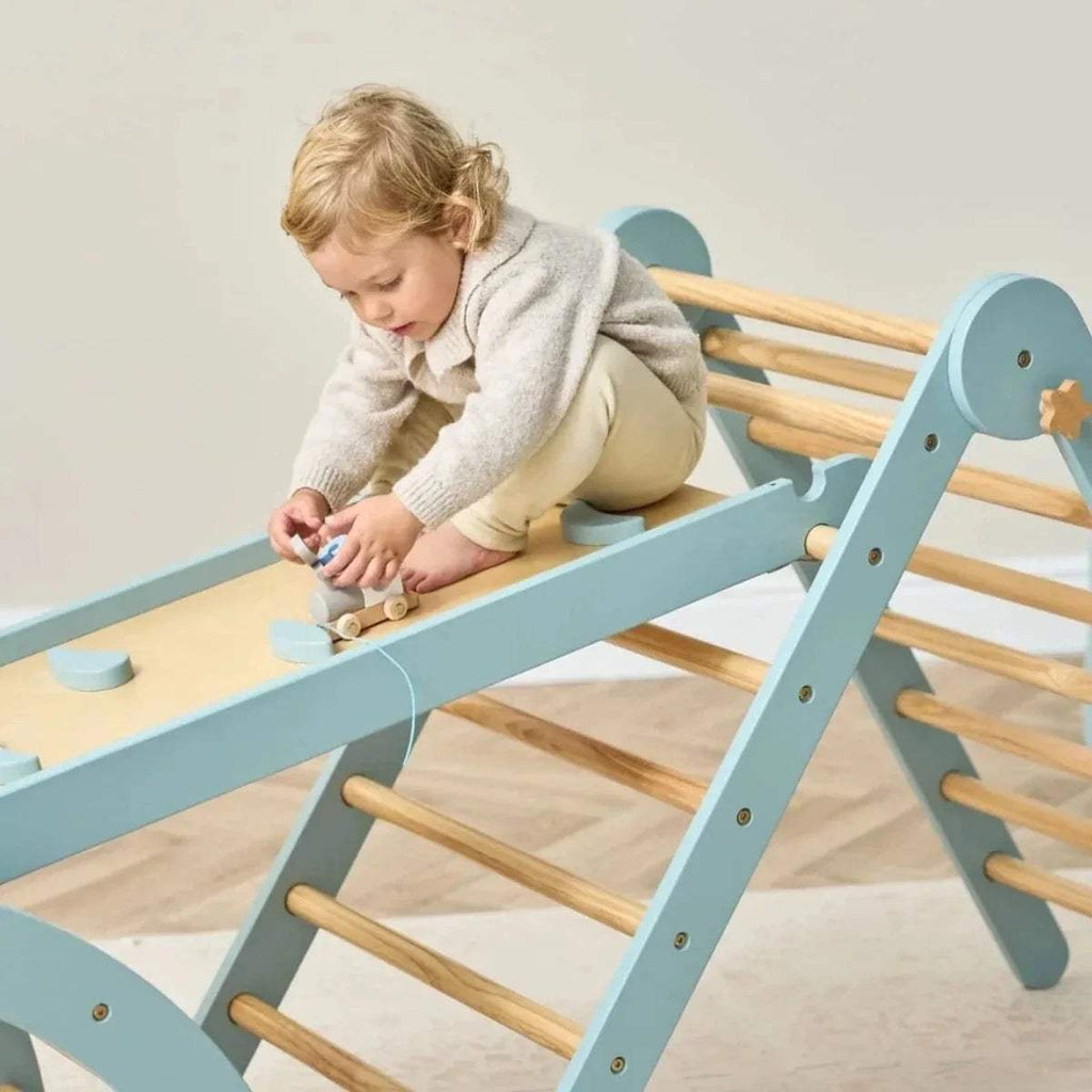 Ocean stone pikler climbing ramp with wooden rungs and angled ladder side panel