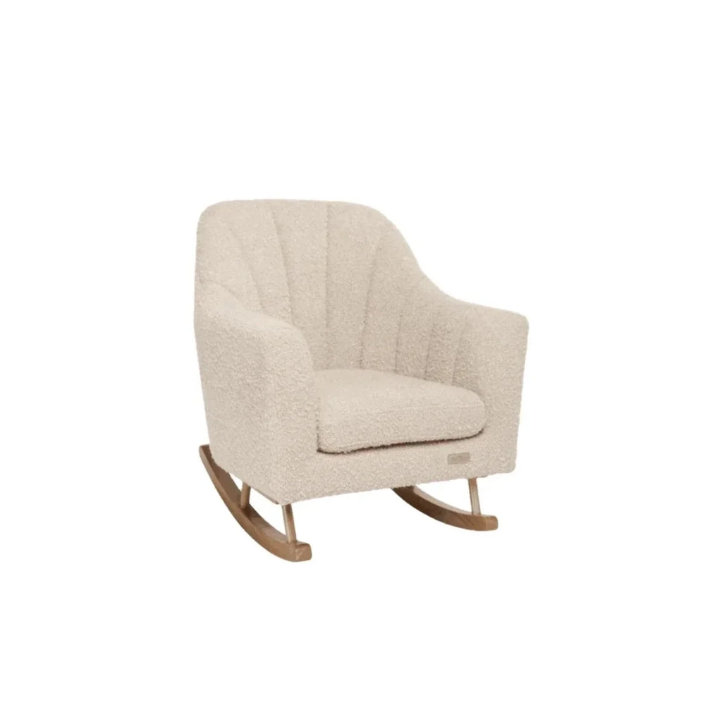 Children's light-cream boucle rocking chair, angled view showing cushioned arms and rockers