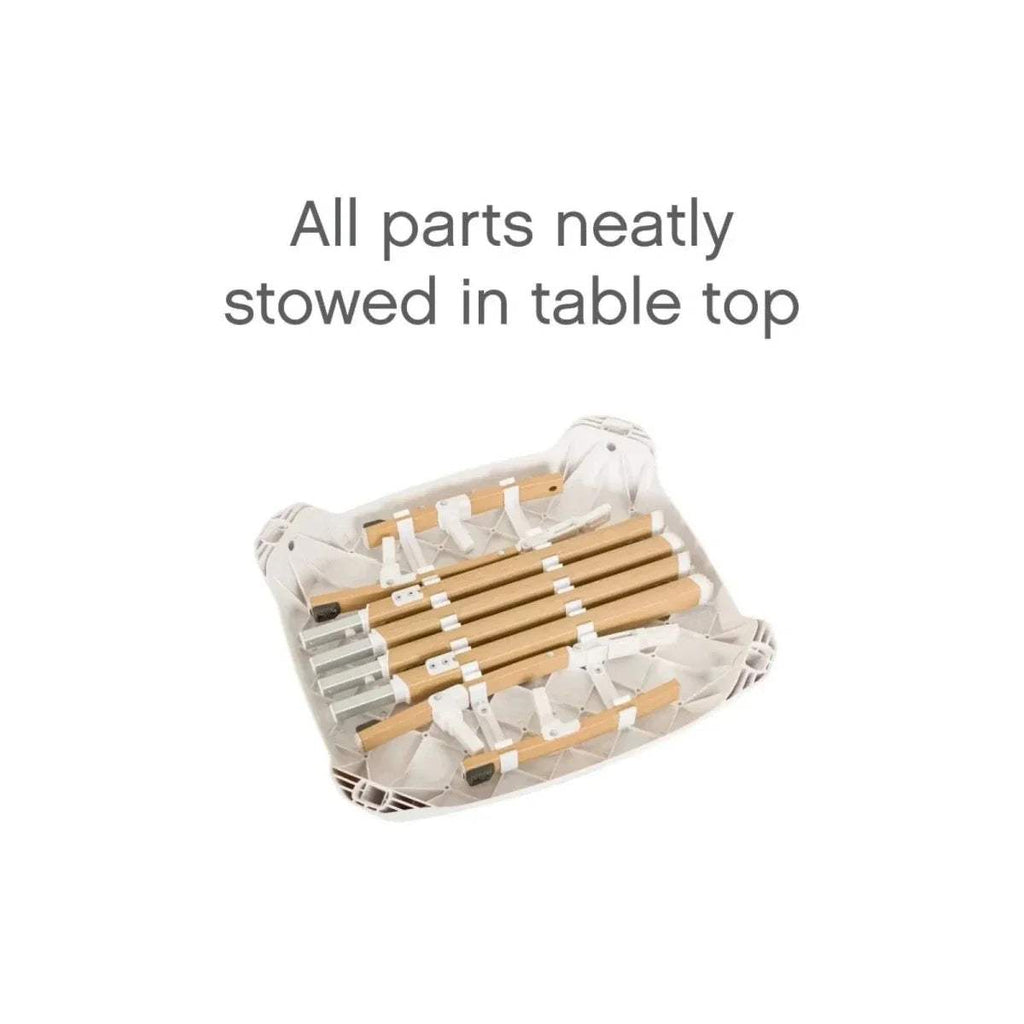 Highchair diagram indicating parts stowed neatly in the table top
