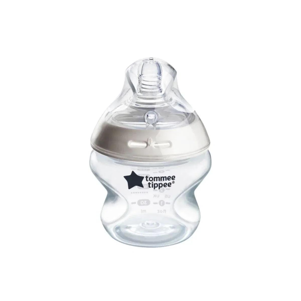 Clear baby feeding bottle with extra-slow flow teat and Tommee Tippee logo, 150 ml