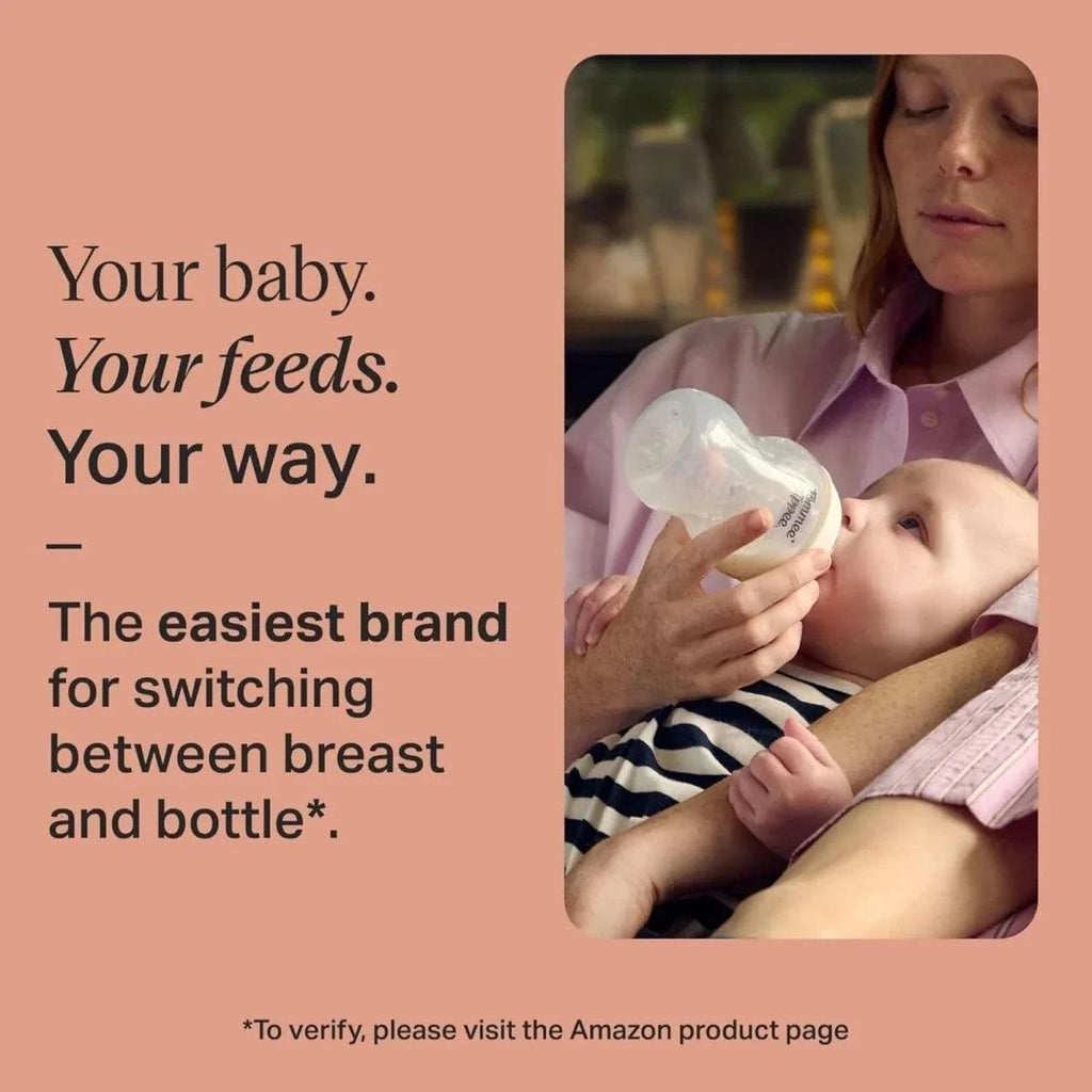 Baby feeding bottle held to baby’s mouth with soft teat on a clear 150 ml bottle