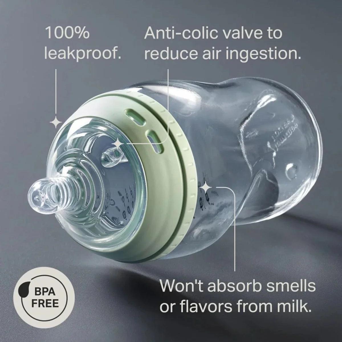 Glass baby bottle with green anti-colic valve and BPA-free mark