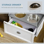White pet feeding station with open storage drawer and two stainless steel bowls
