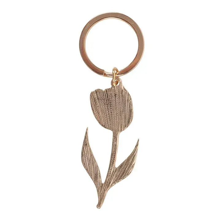 Enamel flower keyring with gold ring and beige-brown leaf charm