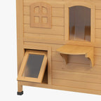 Outdoor wooden cat house close-up of arched windows, side opening, and small front step platform