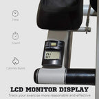 Grey stepper with LCD monitor display and textured black handlebar grips