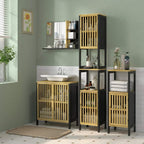 Set of under sink cabinets with bamboo slat doors and black frames in a bathroom vanity area