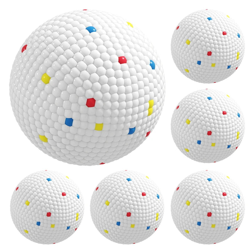 Set of 6 white textured dog balls with colorful square and dot accents